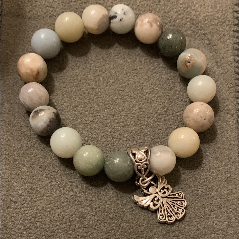 Cream and Green Beaded Bracelet with Intricate Silver Charms